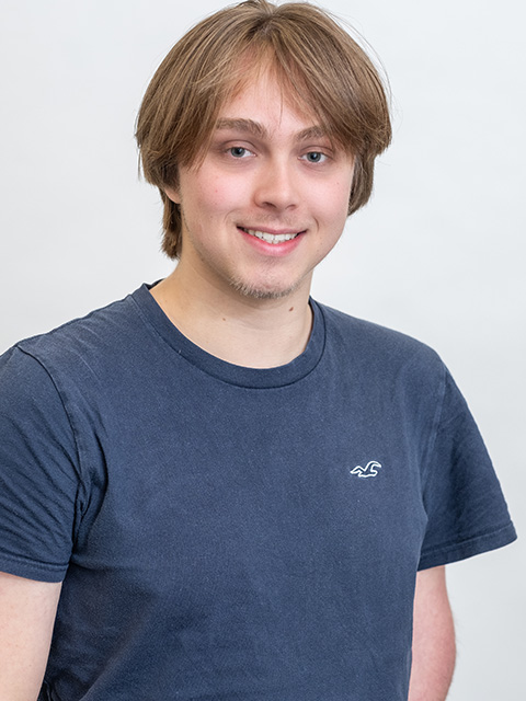 Portrait photograph of staff member, Thomas Crook